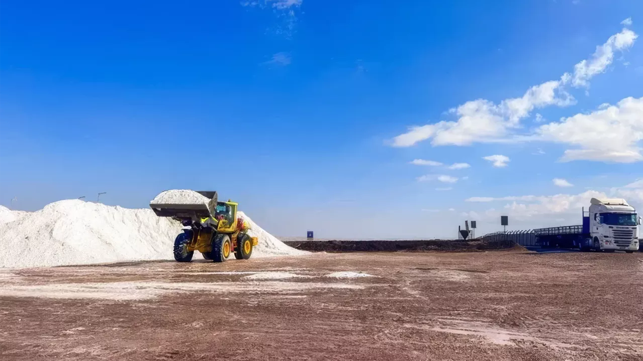 Front Loader and truck loading salts.