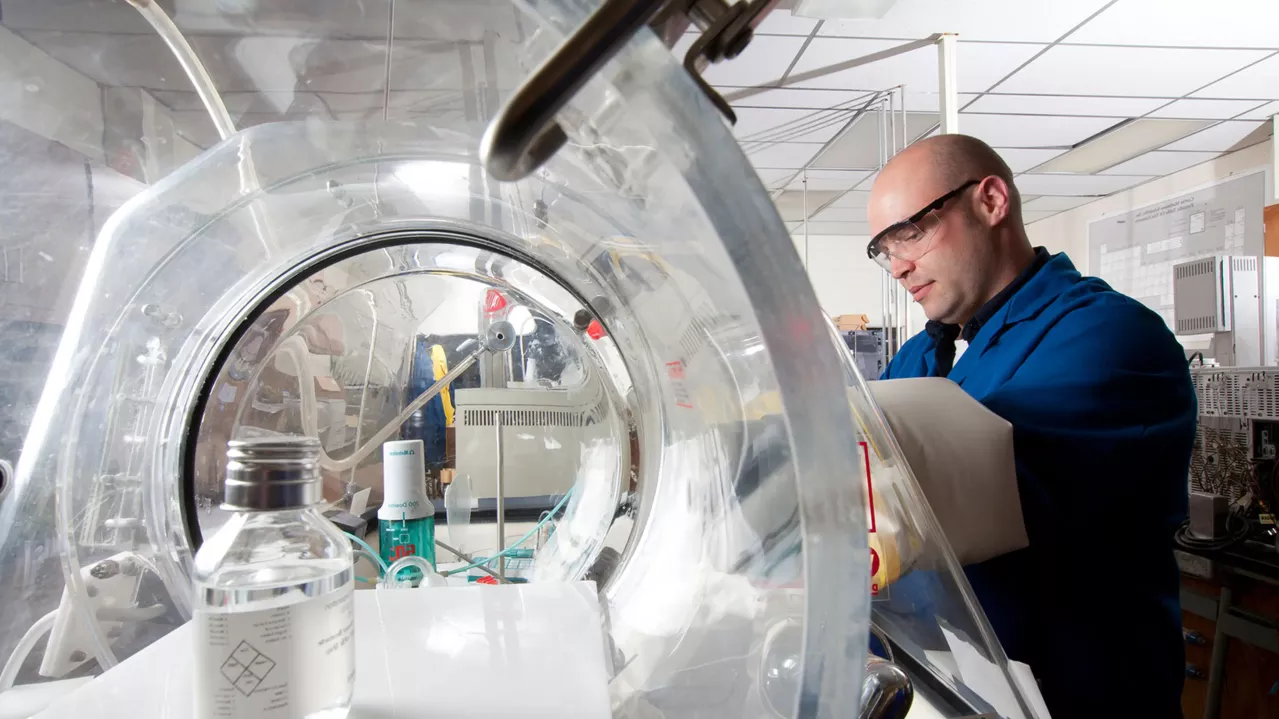 Man working in lab. 